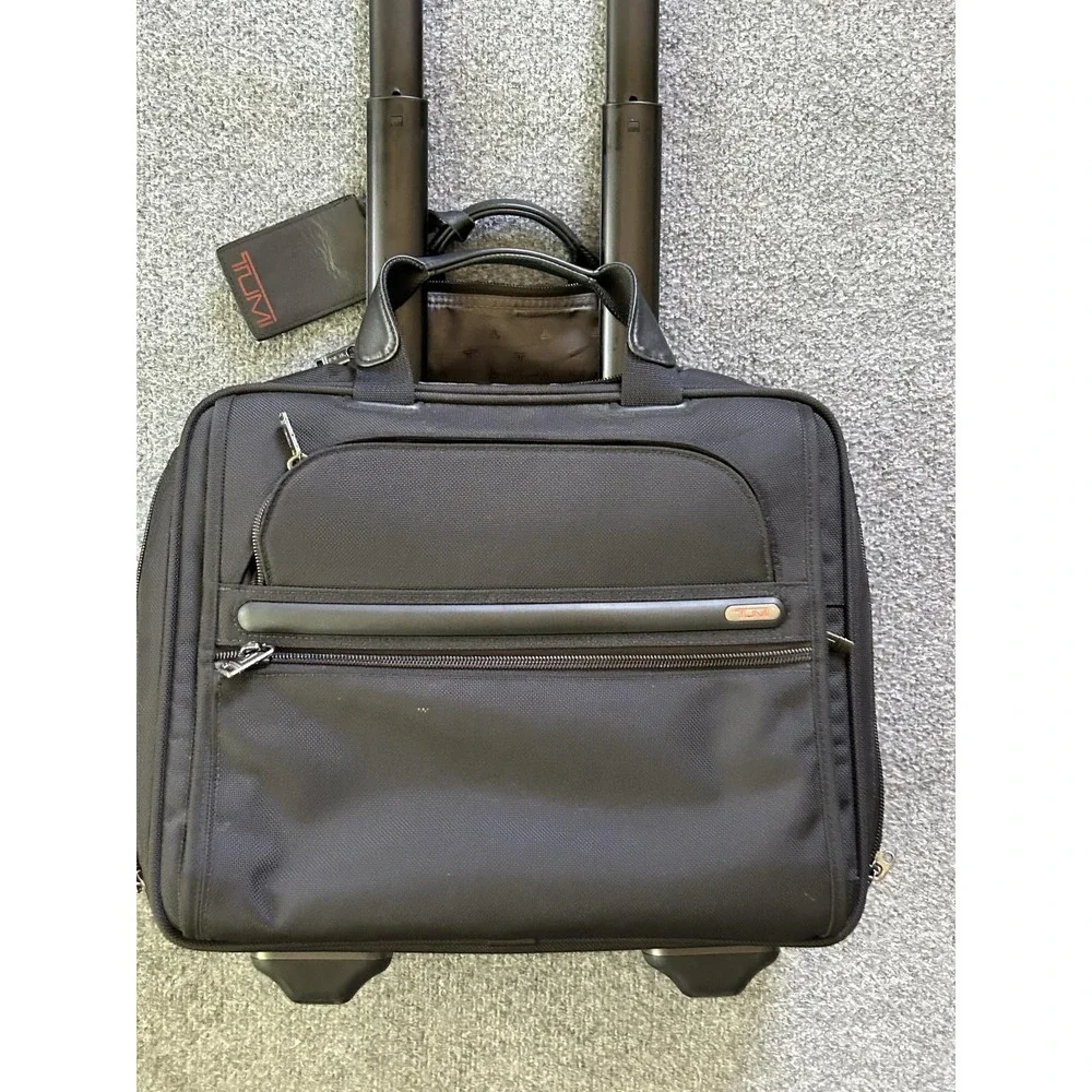TUMI Alpha Wheeled Compact Computer Brief Black Ballistic Nylon Rolling 26102